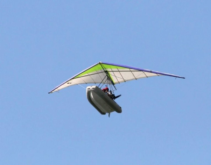 a person riding a kiteboard flying through the sky