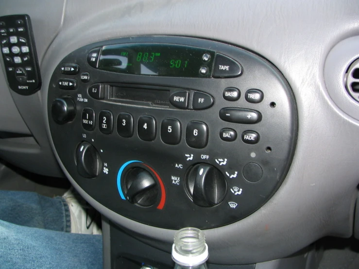 the dashboard of a car with ons and other control ons