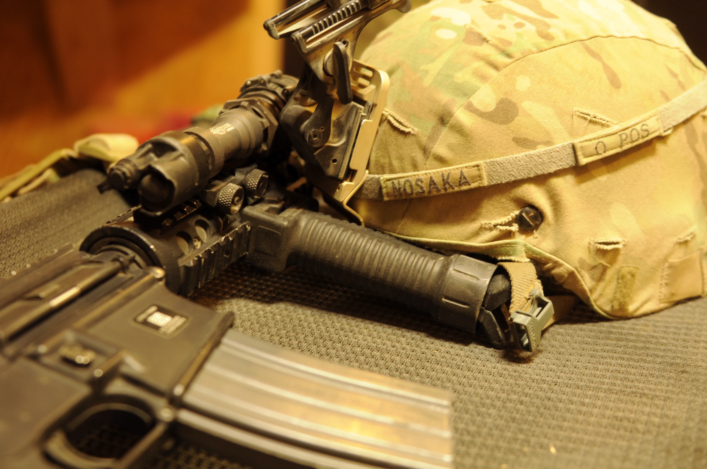 a close up of a helmet with a rifle
