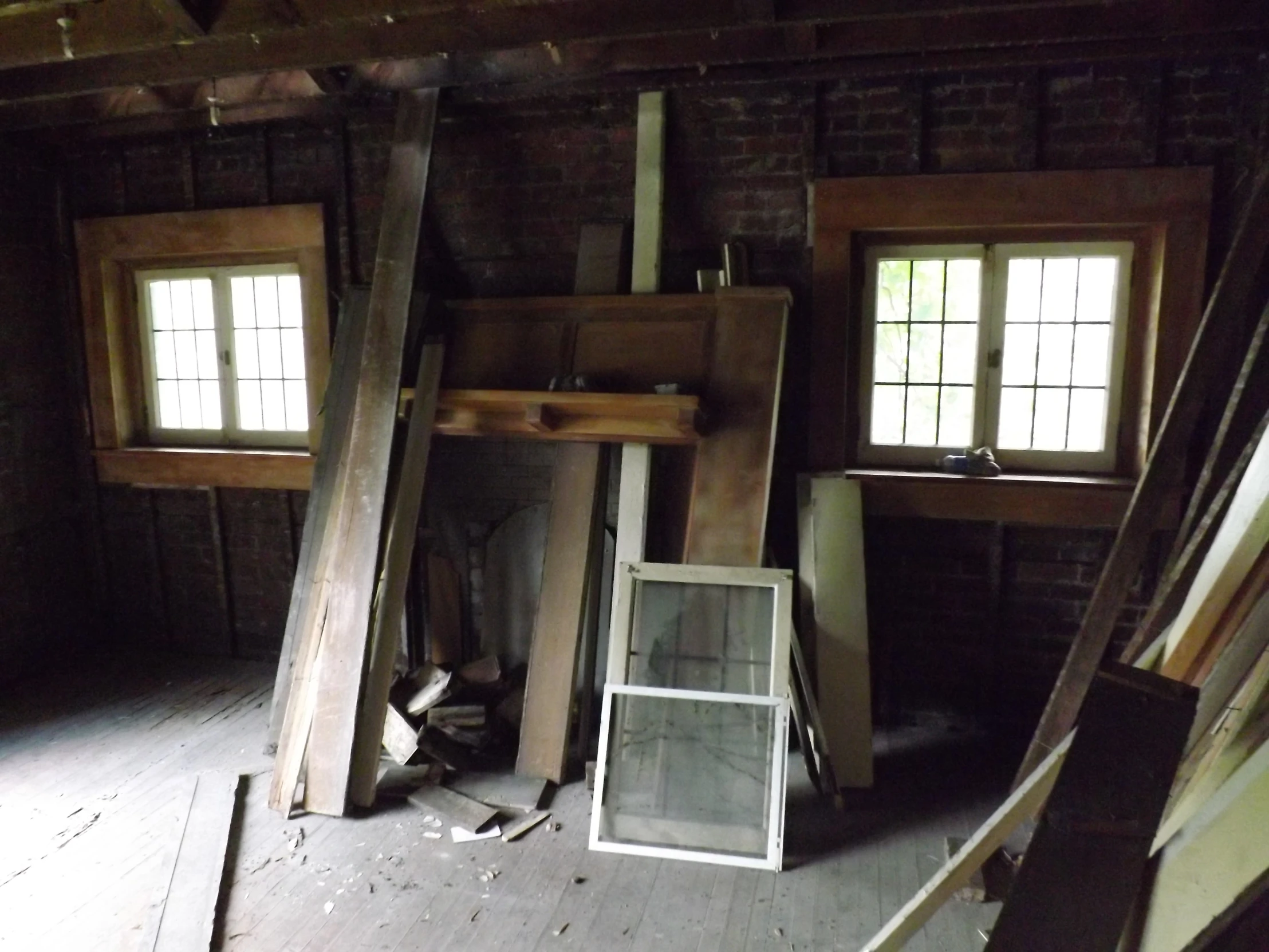 a room that has been moved with wood flooring