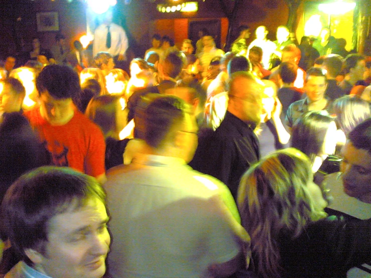 a large group of people at a night club