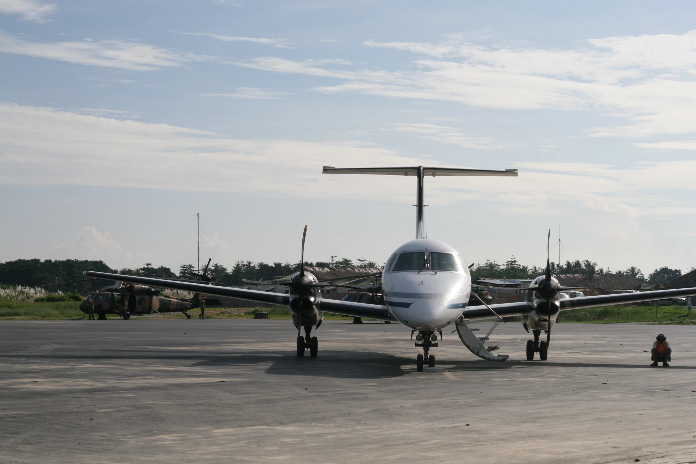 there is a small airplane that is stopped on the runway