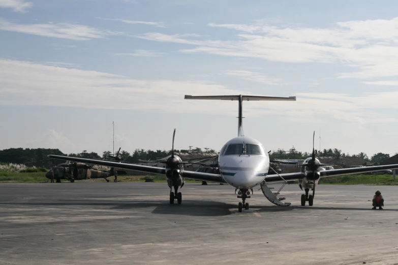 there is a small airplane that is stopped on the runway