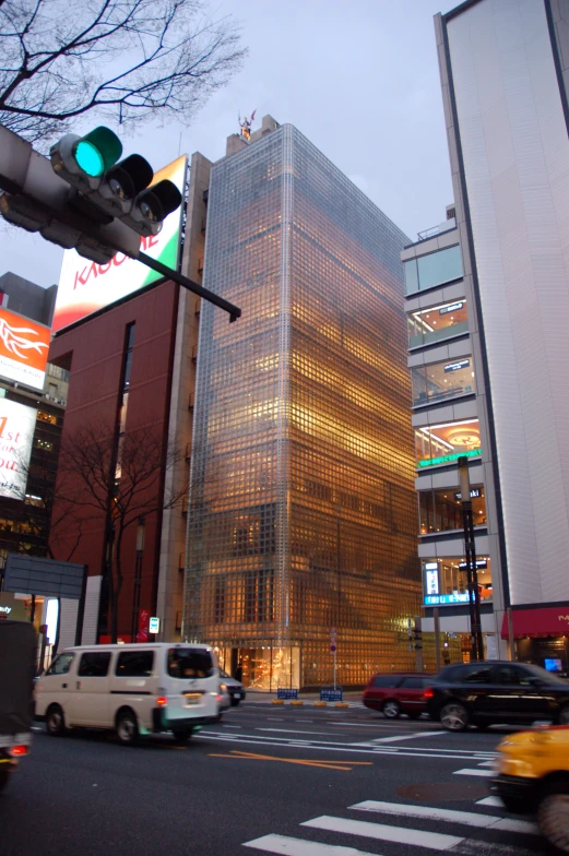 there is a traffic light in the middle of a busy city