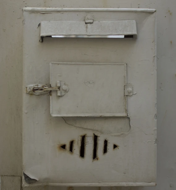 a door that is made of soing white and has several arrows on it