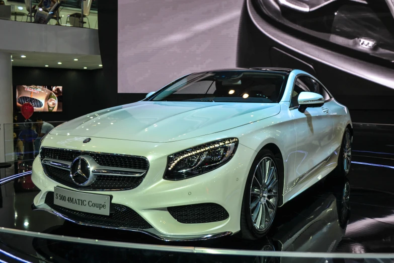 mercedes benz coupe in white on display at the geneva motor show