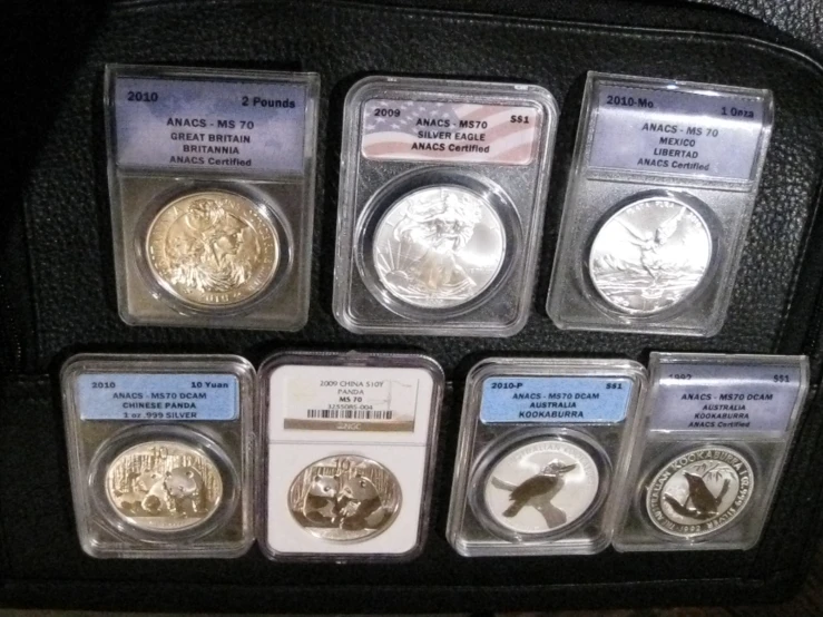 five coin set with the american states in a case