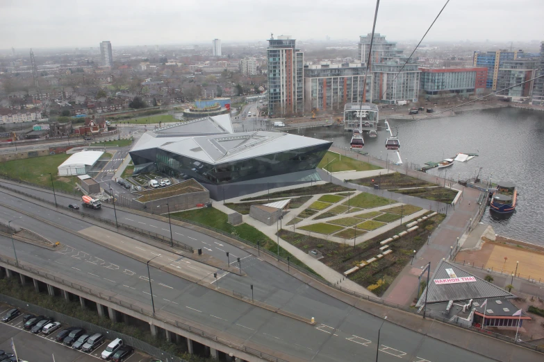 the exterior of a building with large green roof