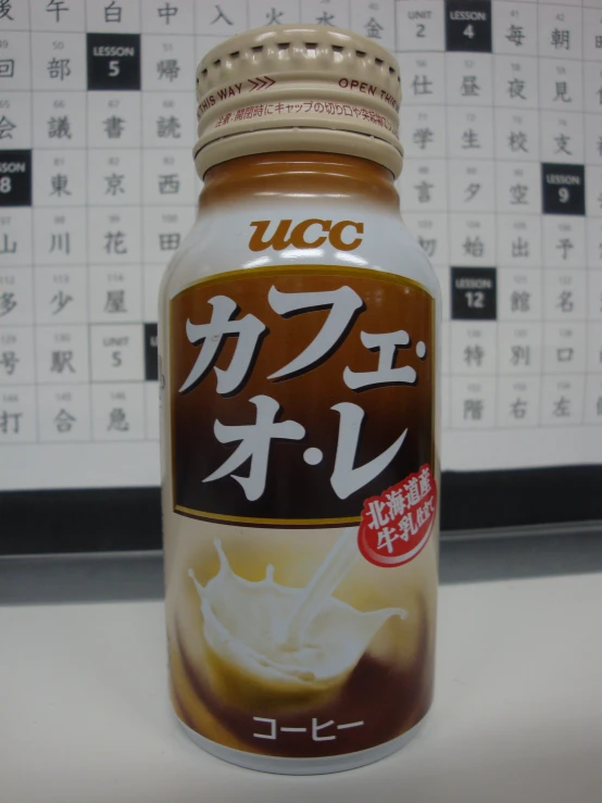 a jar of yuc liquid with asian writing