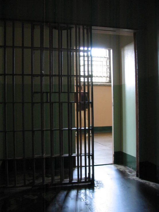 a  cell with bars on the walls