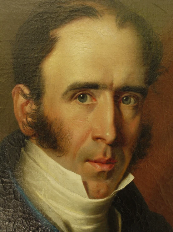 an old portrait of a man with his hair pulled back