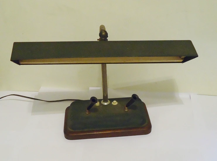 an electrical device made with wood and metal