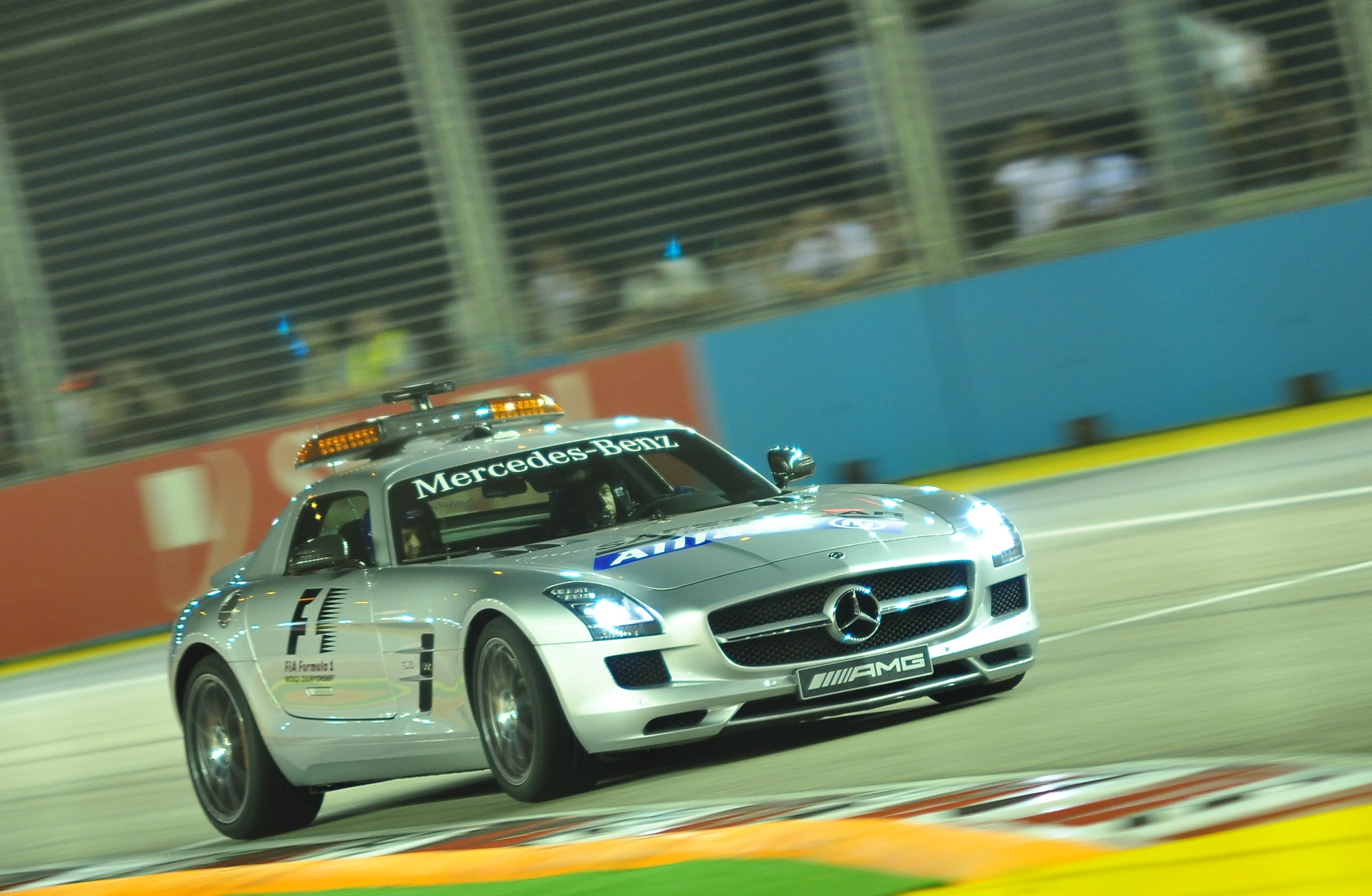 a mercedes sls is racing on the track