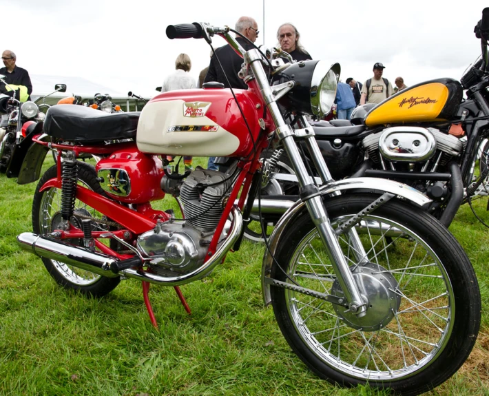 a couple of motor bikes are sitting together