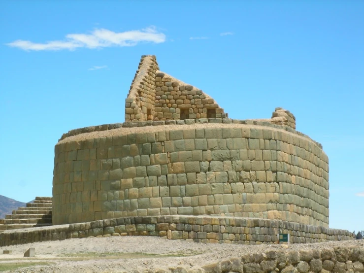 a very old looking tower with some stairs