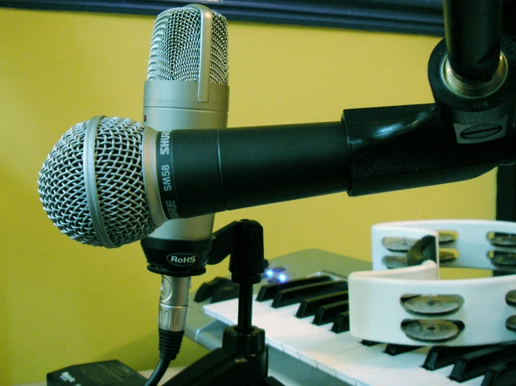 two black microphones next to each other