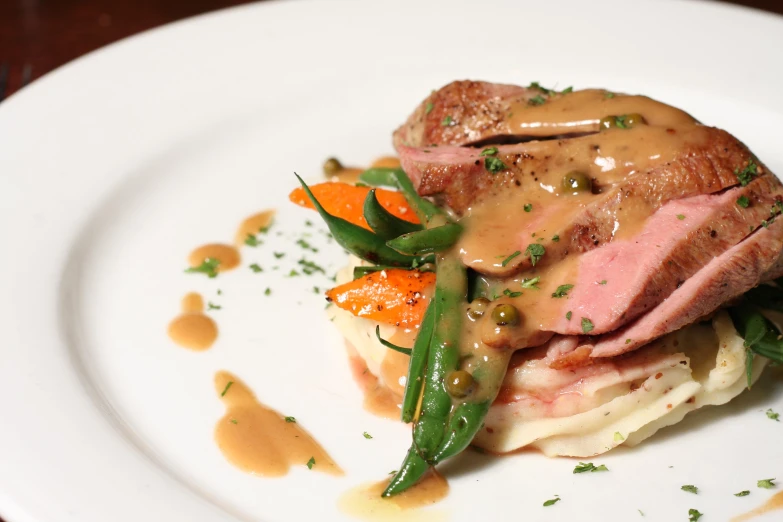 food entree on white plate on table