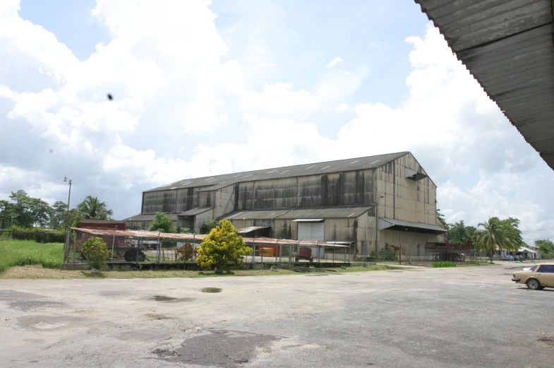 an old building with a broken down roof