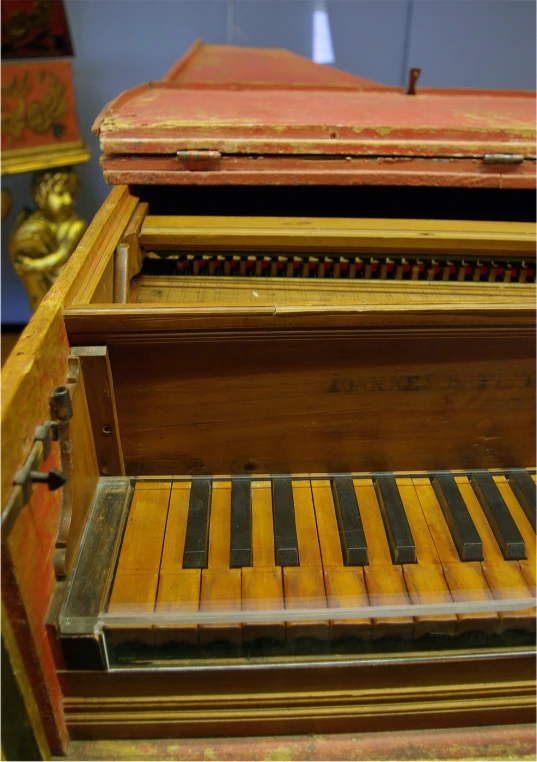 a wood musical instrument sitting on top of a wooden table