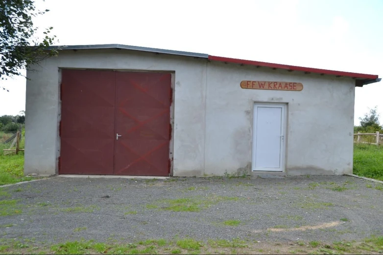 the garage has two doors and no windows on it