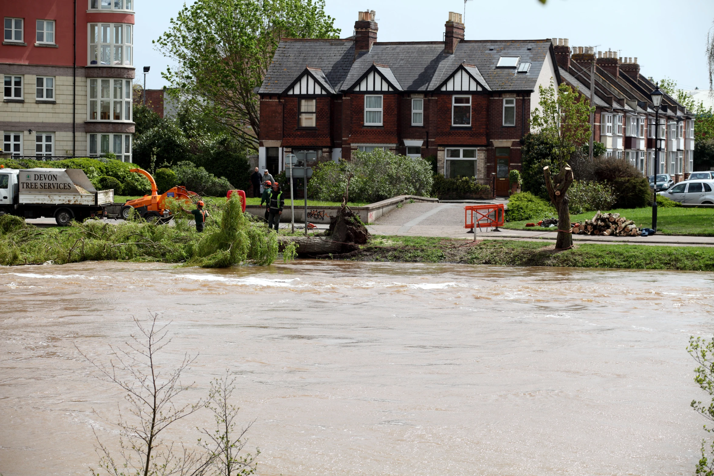 an image of there are flood waters going through the road