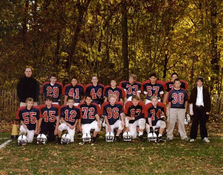 a football team with players posing for a picture