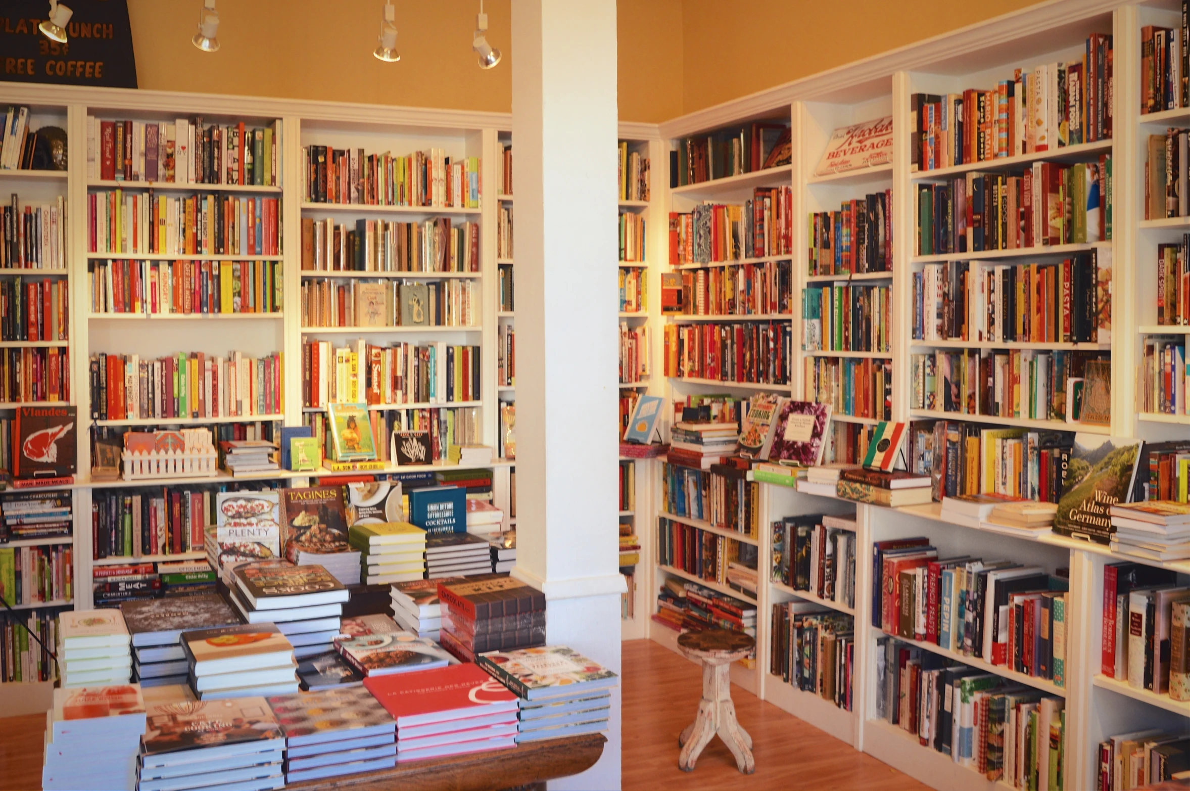 an open bookshelf filled with lots of colorful books