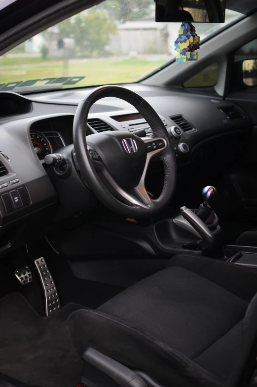 the inside of a car with all its instruments