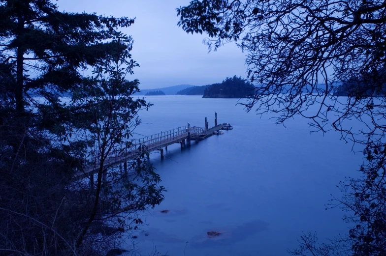 a bridge crosses over a large body of water