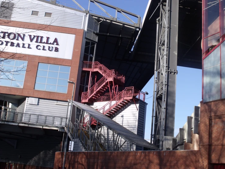 a staircase leads down to an athletic stadium