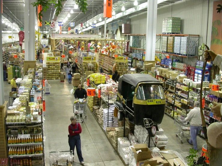 an indoor supermarket that has a large selection of goods
