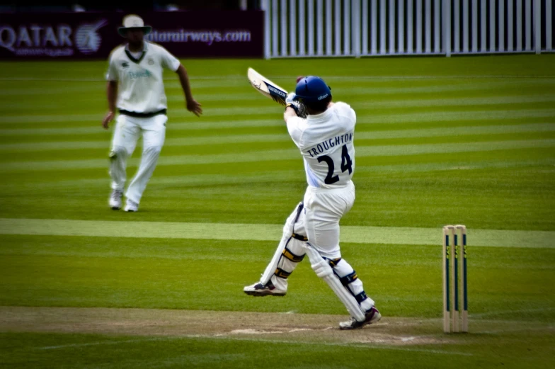 a person with a bat on a field