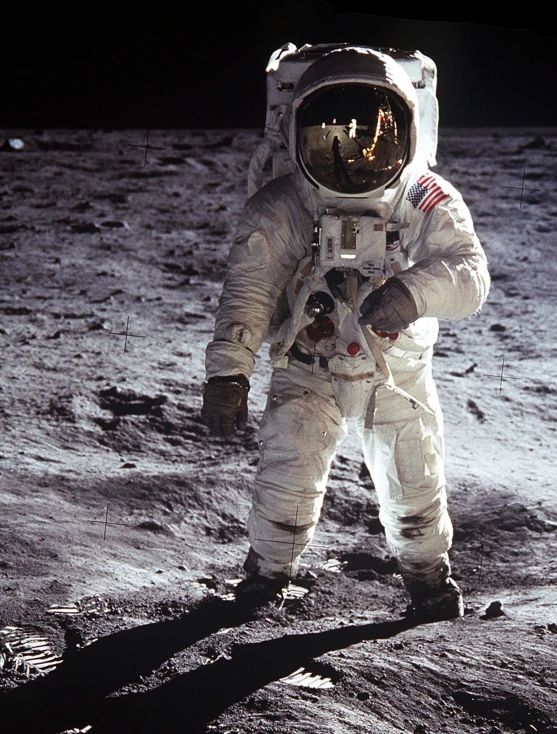 an astronaut is walking on the moon,