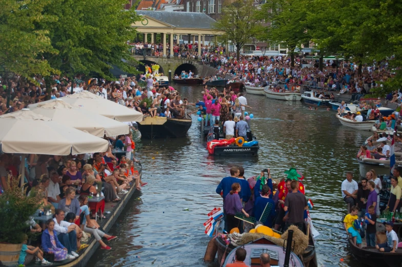 a bunch of people that are on the river