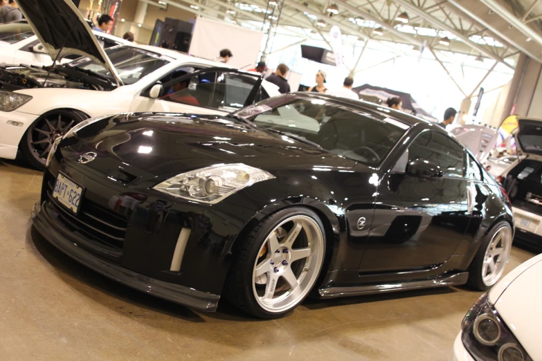 a close up of a sports car in a garage