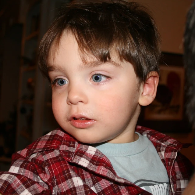 an image of a boy looking into the camera