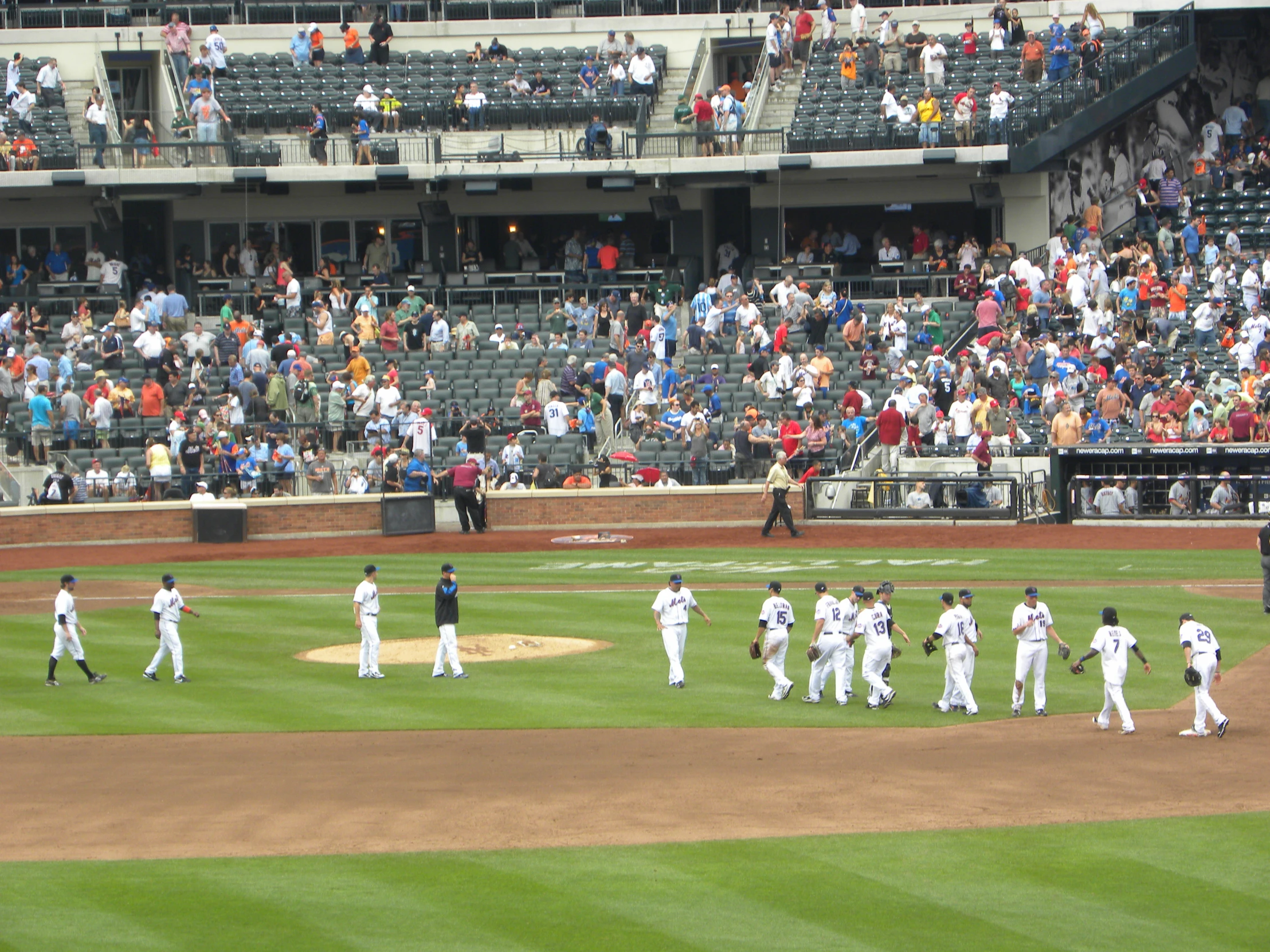 a number of baseball players on a field