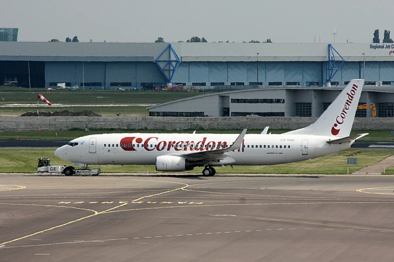 an airplane sitting on top of a runway