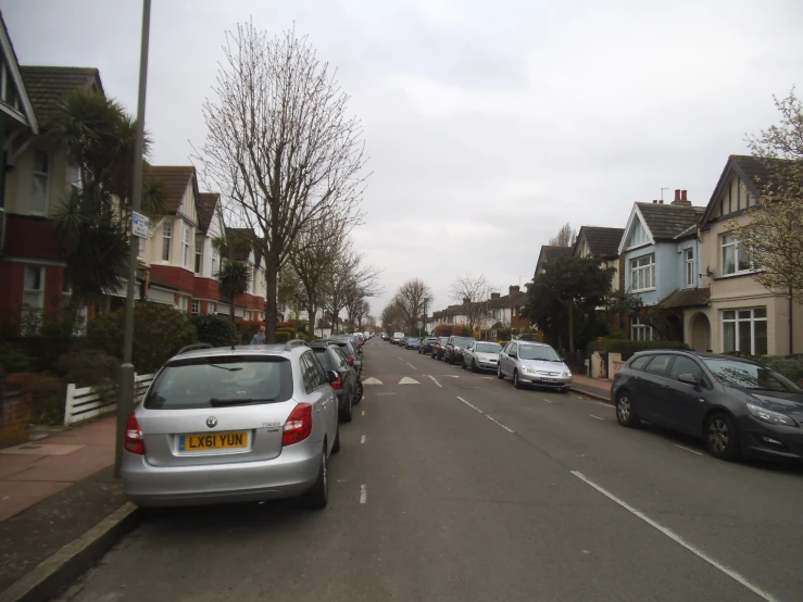 a few cars parked on the side of the road