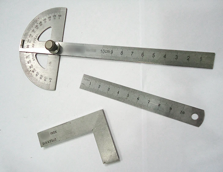 a set of tools sits on top of a white table