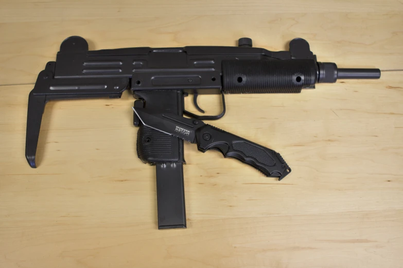 the colt rifle has been modified into a toy gun