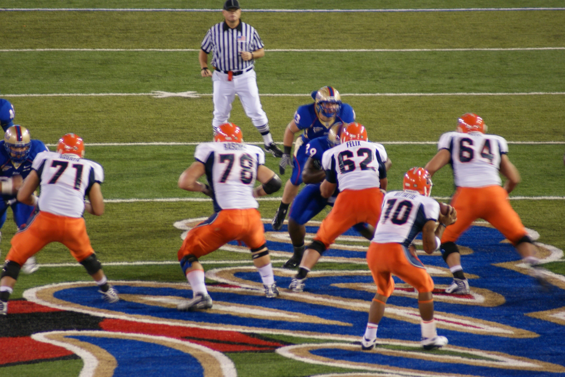 a group of men in uniforms on a field