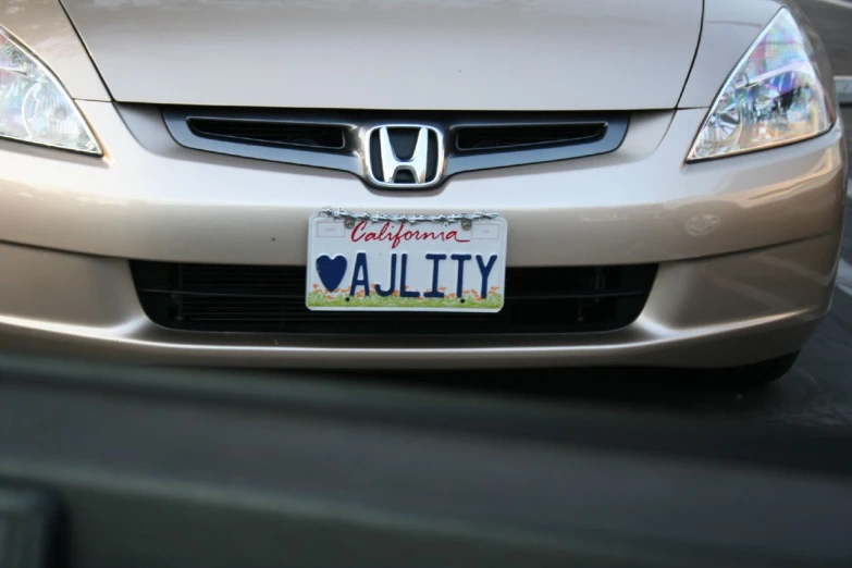 the license plate of a car is advertising a city