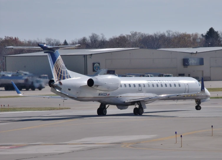 a private jet plane sitting on the runway