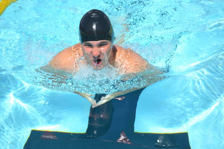 a person with an ear device that is in the water