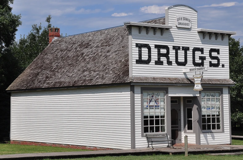 an old store with a large sign on the front