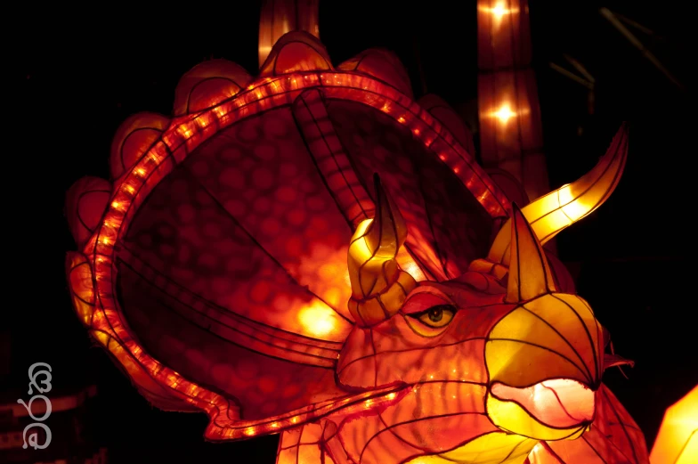 a dragon or animal shaped light decoration with a head