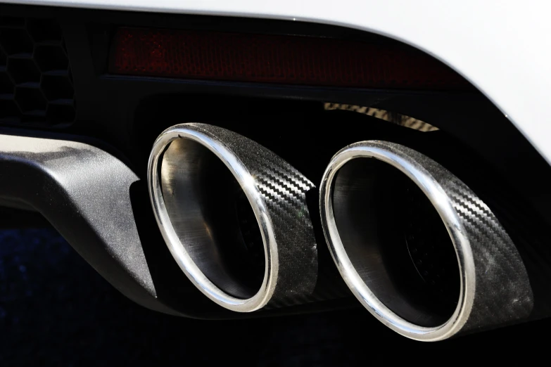 the exhaust pipes of an automobile with carbon foil