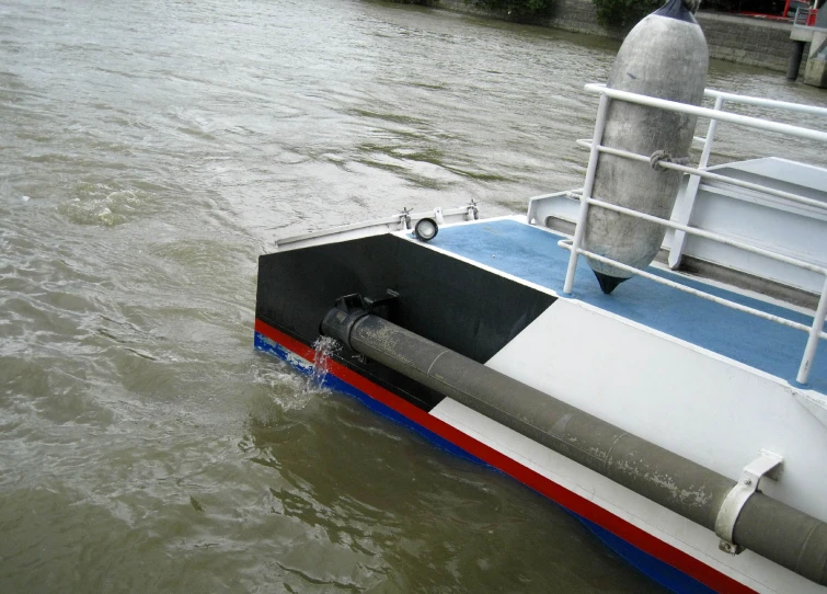 the front of a boat floating down a waterway