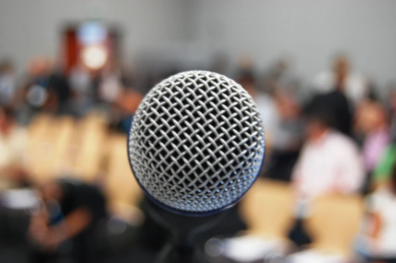 a microphone in front of a group of people